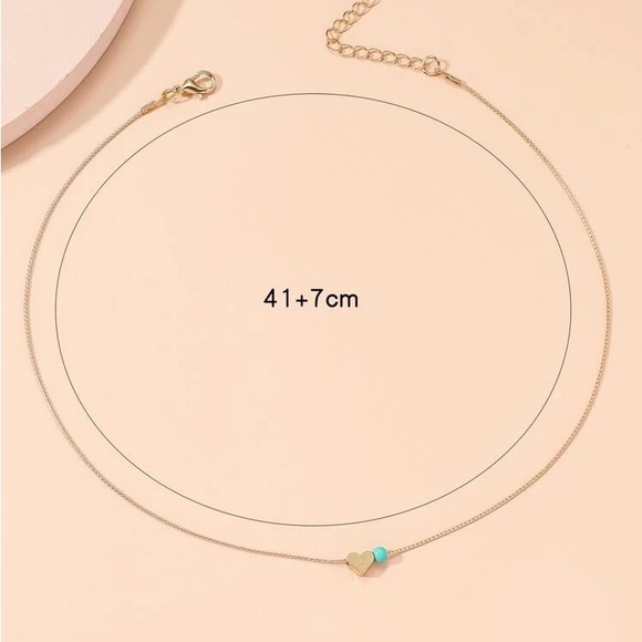 Heart Pendant Necklace with light blue bead on Gold Tone Chain - Picture 6 of 7